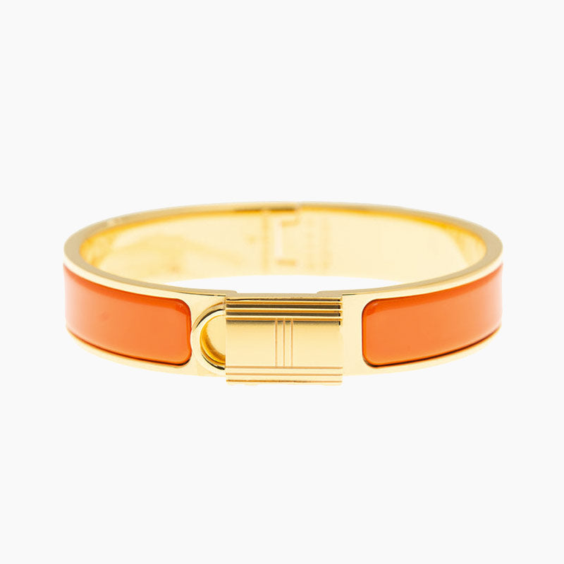 Pulsera dorada con candado naranja Helene